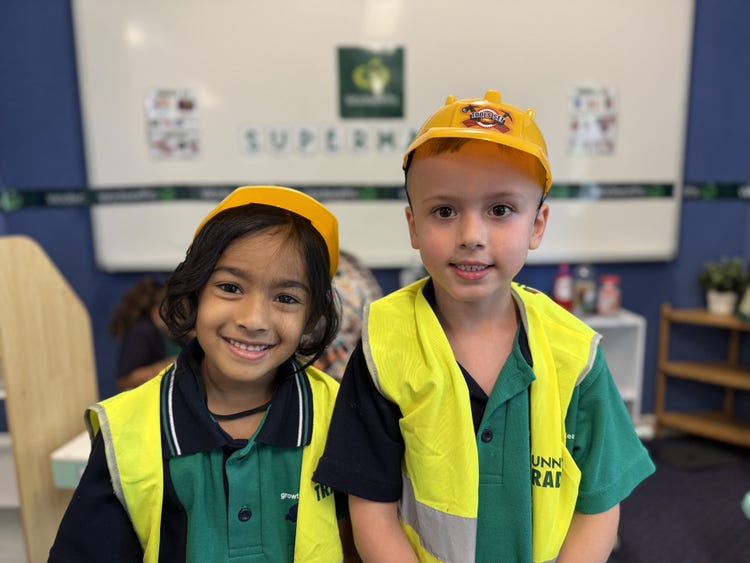 Kids in construction clothes