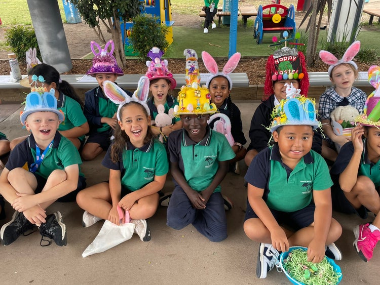 a group of students wearing easter hats